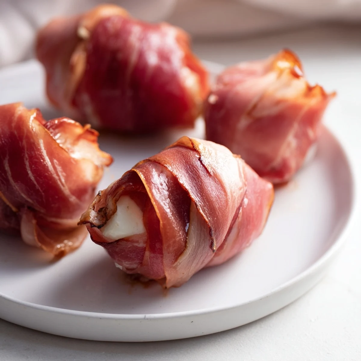 Savory Nautical Knot appetizer of braided prosciutto and string cheese, a delicious party snack idea.