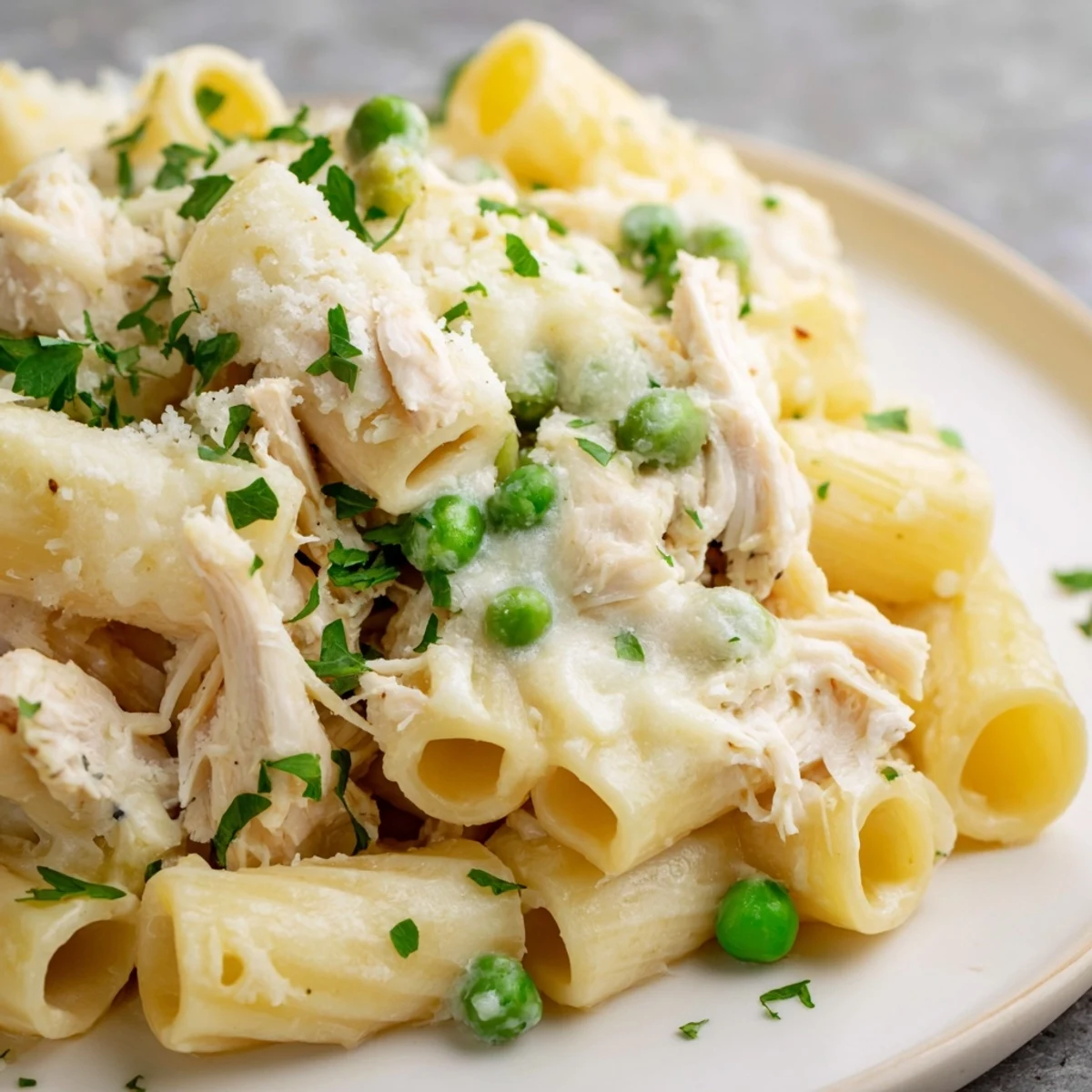 Creamy Slow Cooker Chicken Alfredo Pasta Bake, bubbling hot, a delightful family meal.