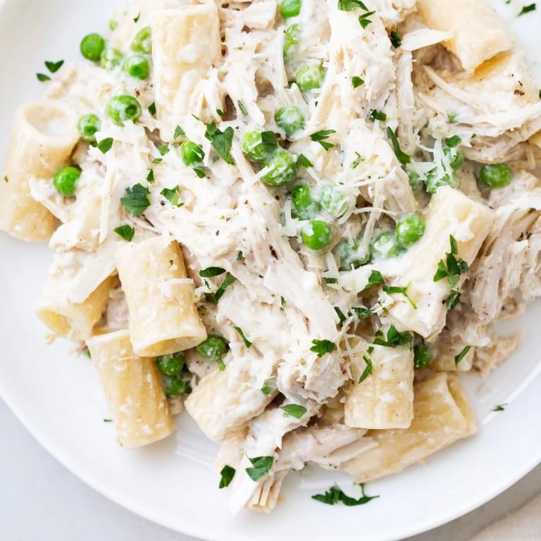 Perfectly cooked Slow Cooker Chicken Alfredo Pasta Bake, ready for a comforting weeknight dinner.