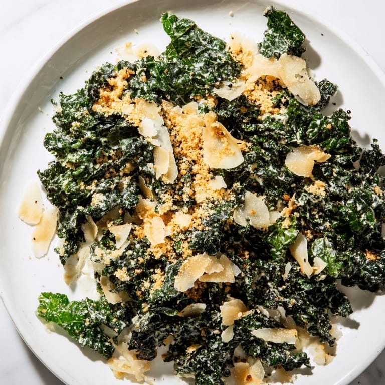 Bright Garlic Parmesan Kale Salad with tender kale, crunchy panko, and a zesty lemon-garlic dressing.